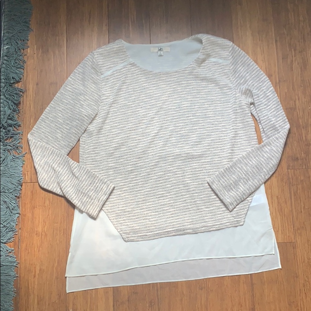 Long sleeve top with connected white undershirt.